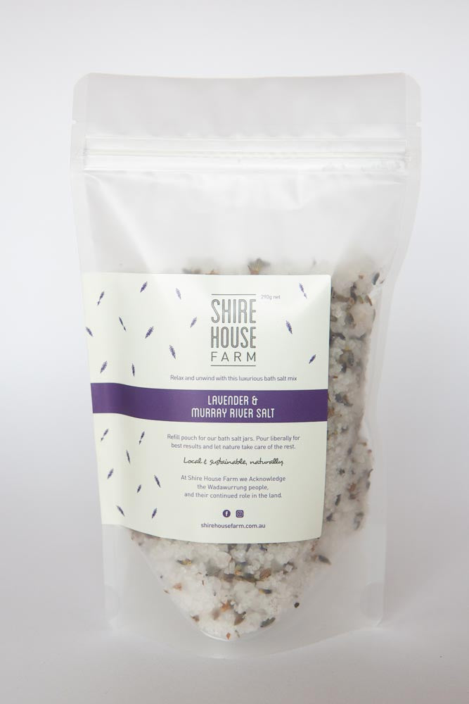 A clear pouch of bath salt on a white background