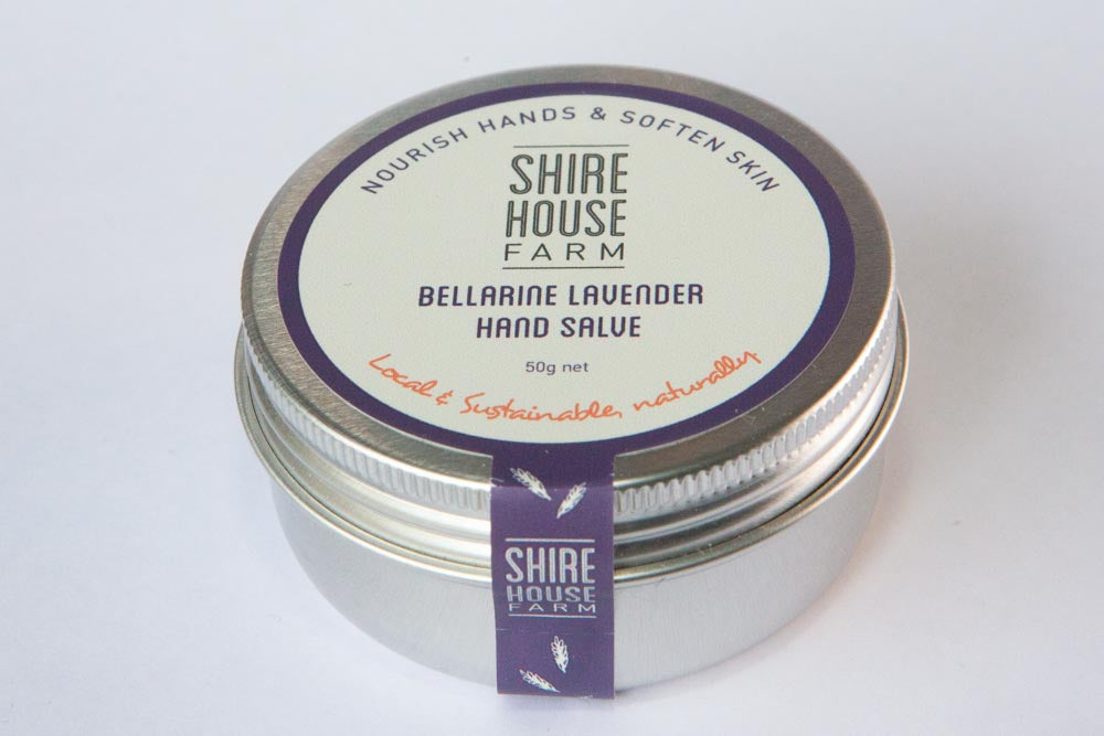 A tine of hand balm on a white background